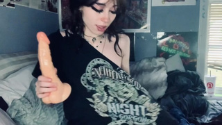 skinny emo Viakitty plays with monstrous toy