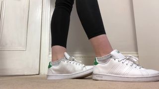 Student showing her stan smiths and socks
